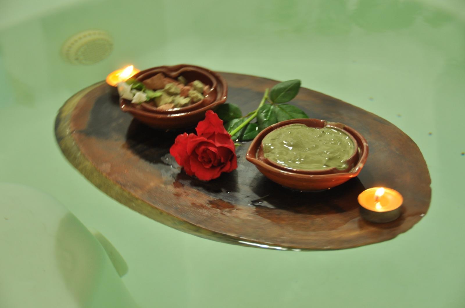 Warm basalt stones arranged for hot-stone therapy